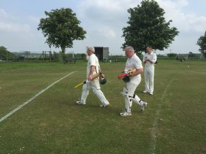 Greig Hearne (100*) and Paul Constantinidi (58*) return to the pavilion at Whitwell after their unbeaten partnership of 179 against Flamstead 2nds